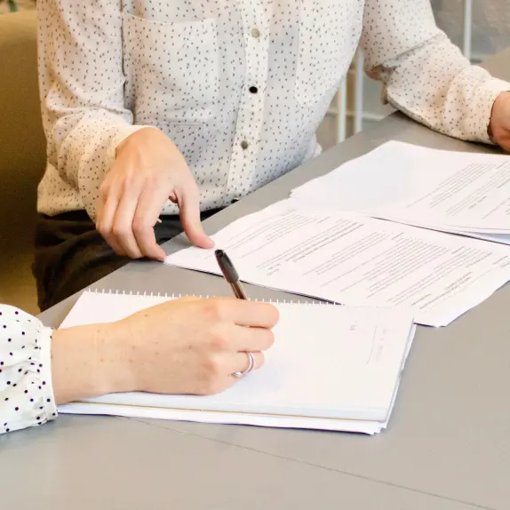 signing probate and trust administration documents on the table